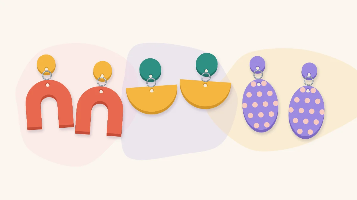 Three pairs of polymer clay dangle earrings in arch, half-moon and oval shapes